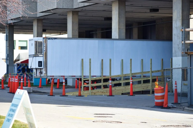 In this April 2020 photo, a refrigerated truck sits outside Aurora Sinai hospital in Milwaukee as a temporary morgue in the early weeks of the coronavirus outbreak.