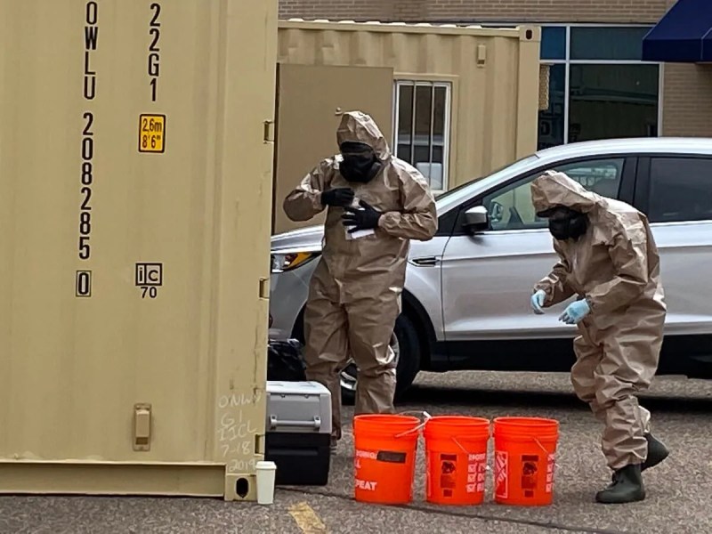 National Guard members conduct COVID-19 tests for attendees at a testing event Sunday in Eau Claire.
