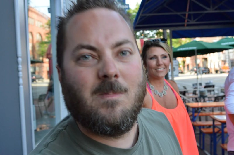 Off-duty Milwaukee Police Officer Matthew Willmann approaches photographer LaTasha Lux before striking her on July 5.