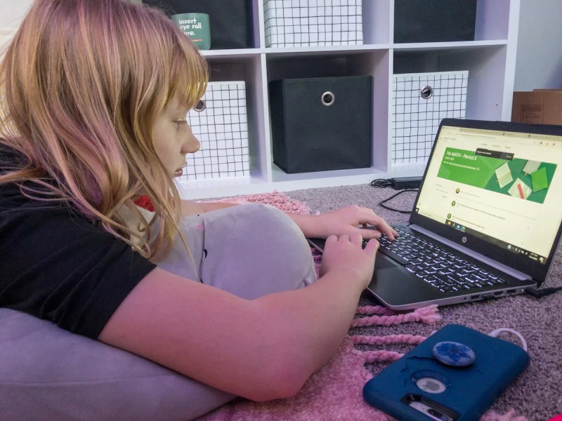 Sara Shelton, 12, of Green Bay works on her schoolwork remotely.