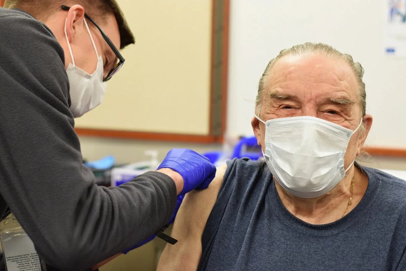 Man getting a COVID-19 vaccine