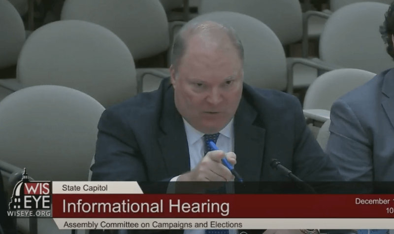 In the screen image from WisconsinEye on Dec. 1, 2021, former Wisconsin Supreme Court Justice Mike Gableman interrupts a state legislator asking questions about the nature of his 2020 election investigation created by Republican lawmakers.