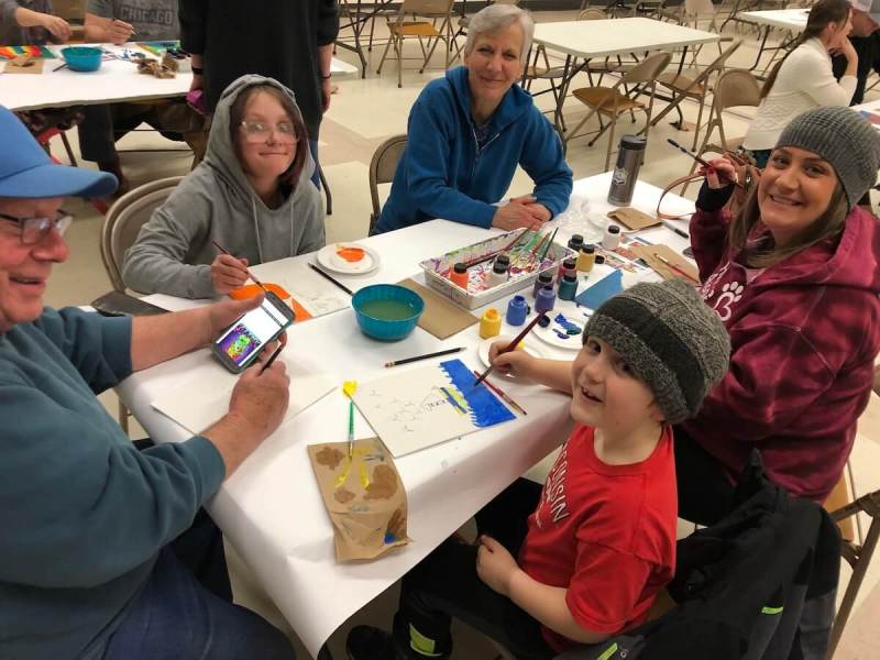 Families attend "Jammin' with the Arts Night" with their students, at an Eau Claire elementary school.