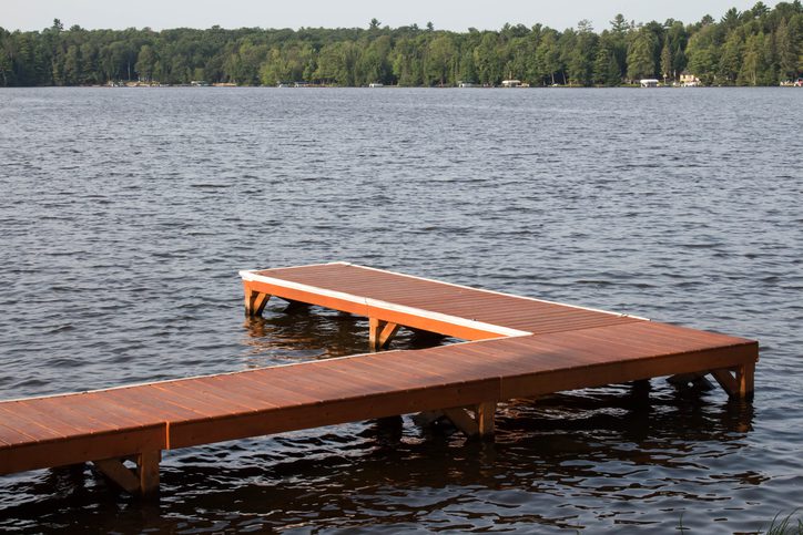 A right angle shaped wooden dock in Eagle River, Wisconsin. This is one of the best fishing spots in Wisconsin