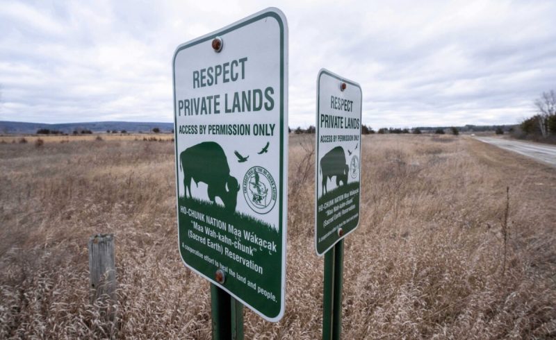 Signs mark land owned by the Ho-Chunk Nation.
