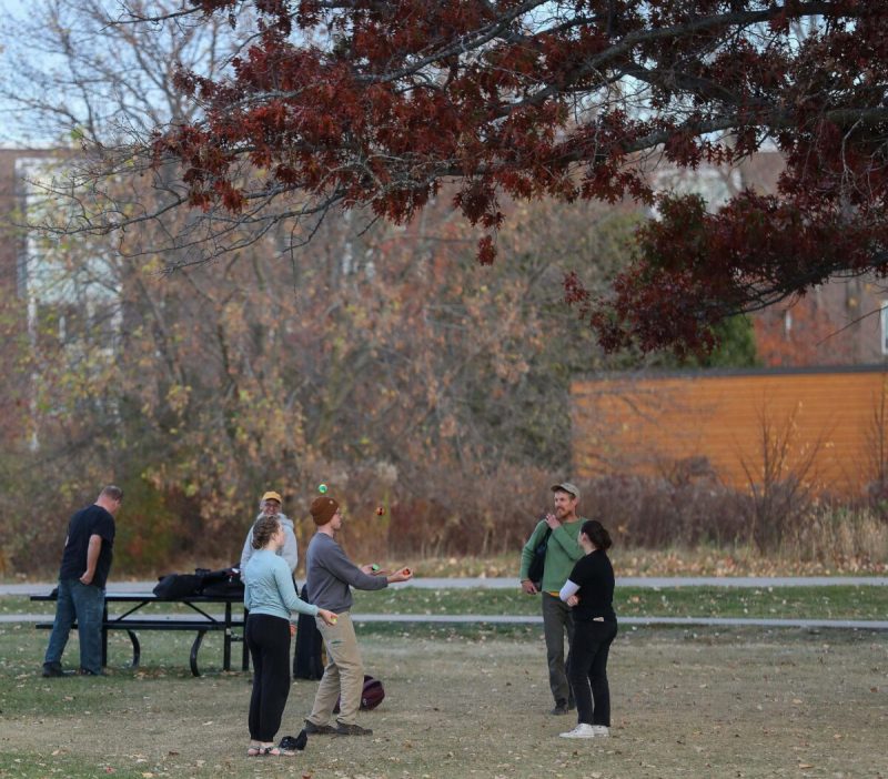 Wisconsin public universities. Students juggling.